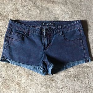 Jean shorts with faded red leopard print